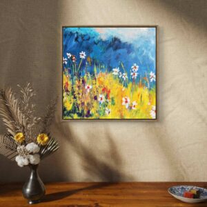 abstract painting displayed in a colorful contemporary interior with tropical plants, an orange cabinet, and coral chair.